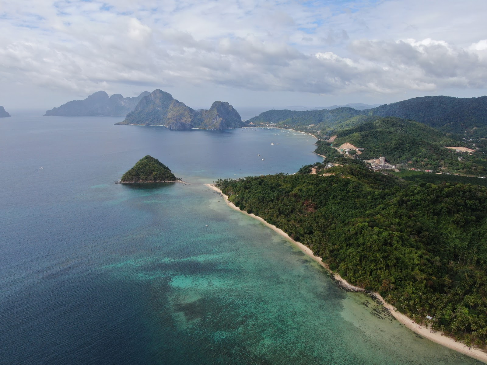 Dolarog Beach'in fotoğrafı düz ve uzun ile birlikte