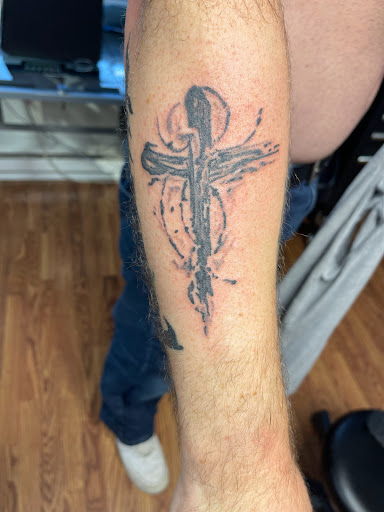 Explore black people tattoo ideas, creative tattoo ideas in Butler, available at Kryptic Skin Tattoo