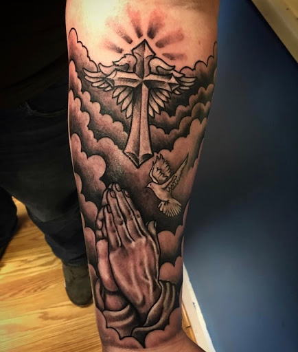 Explore back tattoo idea, creative tattoo ideas in Evans Mills, available at Undeniable Ink