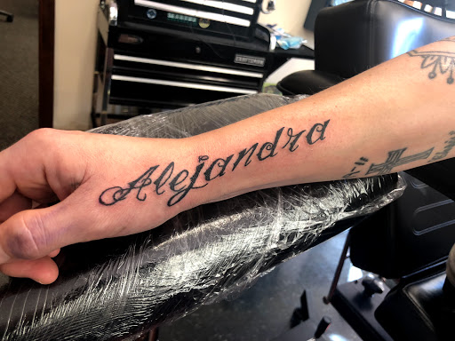 Explore awesome back tattoo ideas, creative tattoo ideas in Charlottesville, available at Mystic Tattoo and Body Piercing