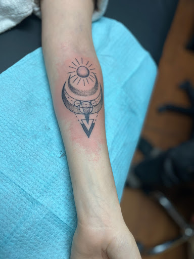 Explore tribal tattoo cover up ideas, creative tattoo ideas in Fredonia, available at Red Bird Tattoo