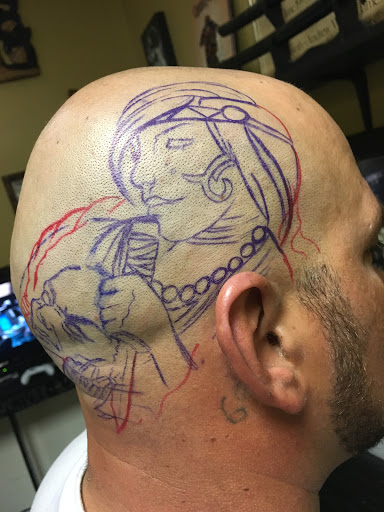 Explore neck tattoo idea men, creative tattoo ideas in Savannah, available at Tatlyfe Studios