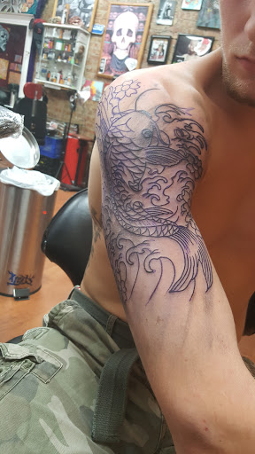 Tattoo Shop «Stained in pain tattoos», reviews and photos, 4211 N Milwaukee Ave, Chicago, IL 60641, USA