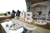 Mina's Boutique Luxury Dresses & Bridal - Photo 2 - Car repair in Sterling Heights, MI, Sterling Heights