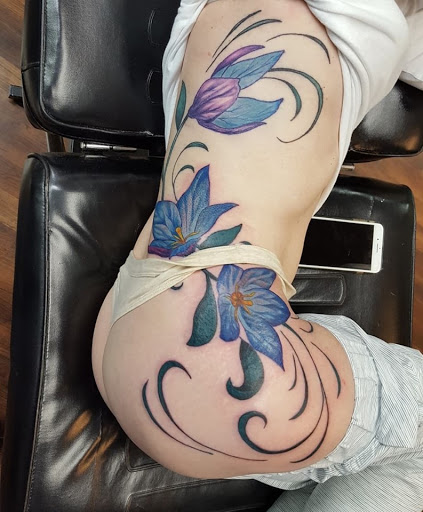 Explore negative space tattoo ideas, creative tattoo ideas in Reno, available at Evolution Tattoo