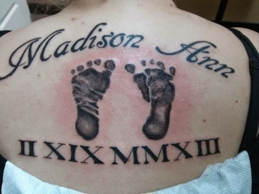 Explore dog ears tattoo ideas, creative tattoo ideas in Lagrangeville, available at Black Cherry Tattoo Studio NY
