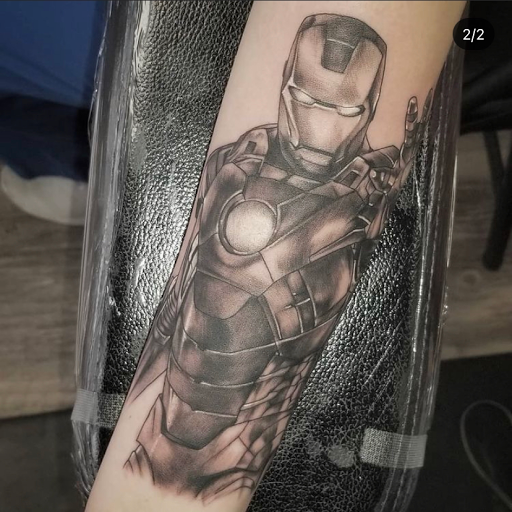 Explore black and white tattoo ideas, creative tattoo ideas in Hazard, available at Lost Gypsy Tattoo