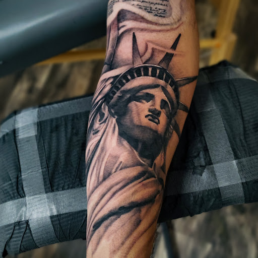 Explore outdoor tattoo sleeve ideas, creative tattoo ideas in Whitehall, available at Legion Tattoo Gallery