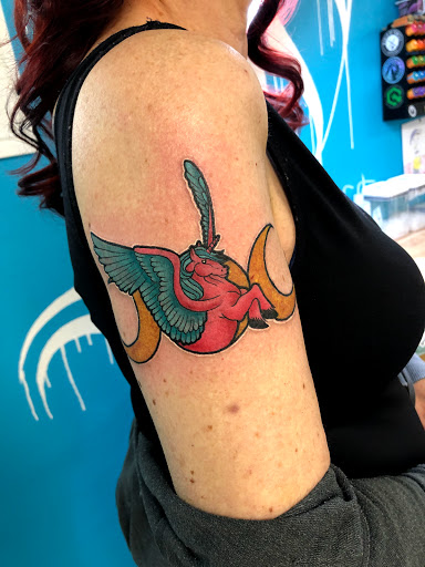 Explore tribal lion tattoo ideas, creative tattoo ideas in Springdale, available at Tattoo Cartel