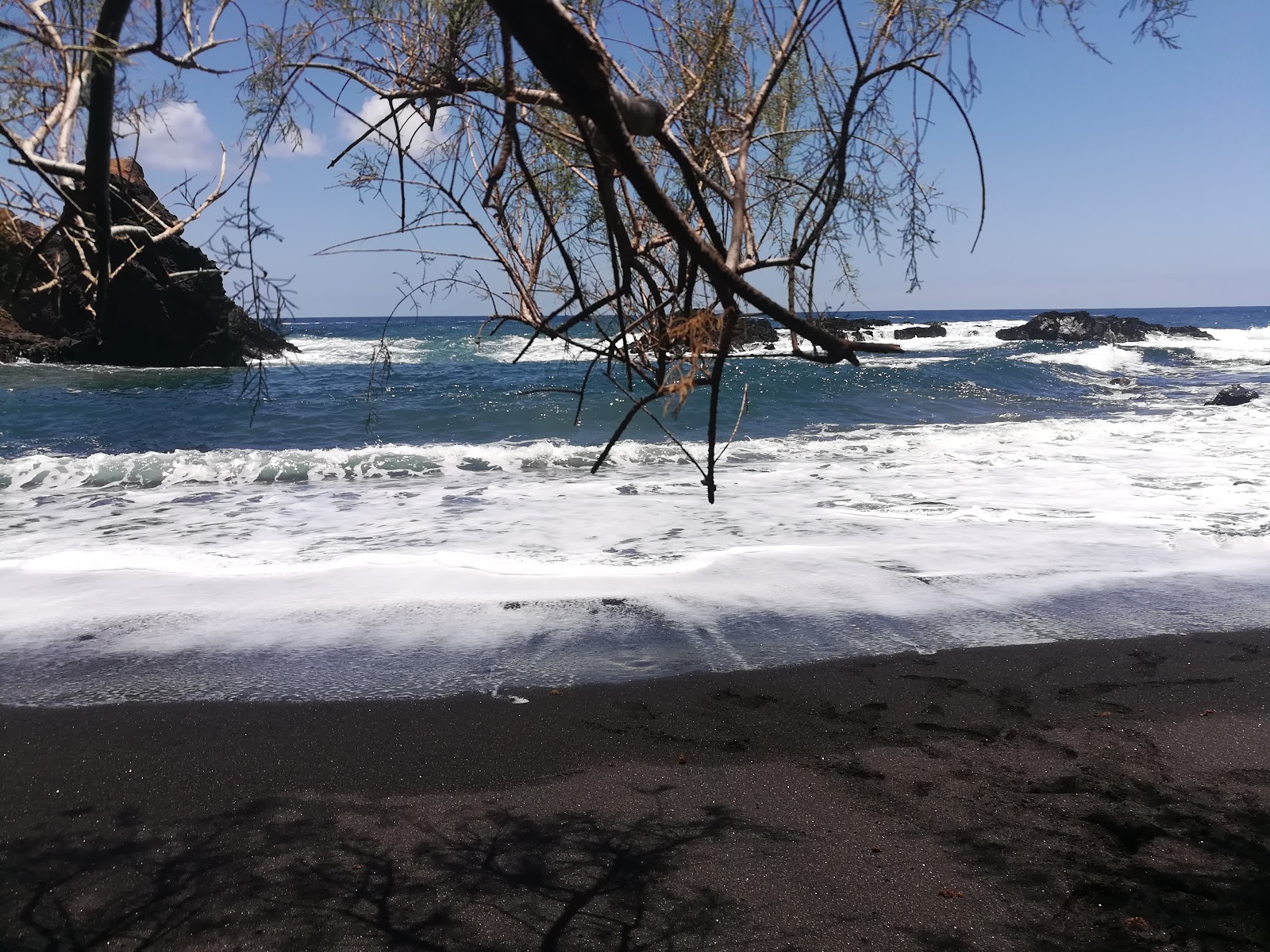 Foto von Playa Casas Blancas und seine wunderschöne Landschaft