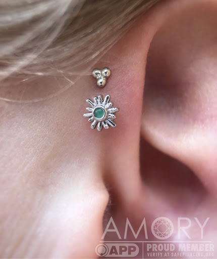 Explore middle of boob tattoo ideas, creative tattoo ideas in Santa Cruz, available at Amory Body Arts