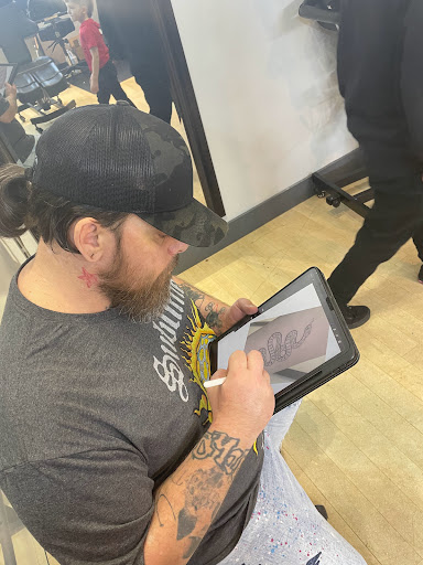 Explore neck name tattoo ideas, creative tattoo ideas in Fort Wayne, available at Grade A Tattoos and Body Piercing