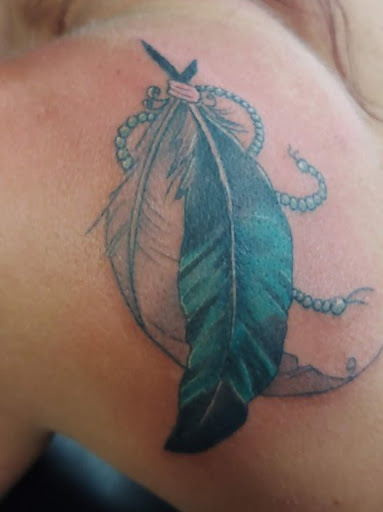 Explore half heart tattoo ideas, creative tattoo ideas in Yorktown, available at Army Navy Tattoo