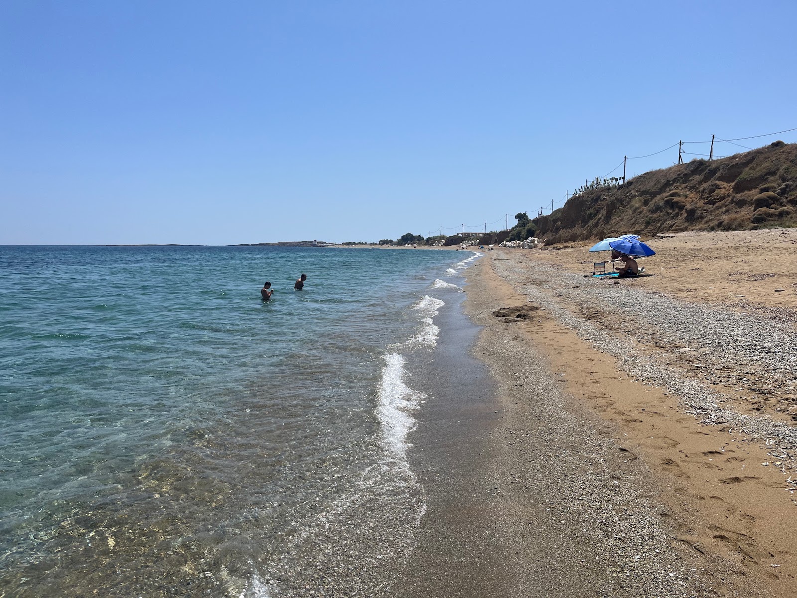 Foto von Gyrismata Beach und die siedlung
