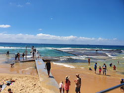 Photo de Austinmer Beach entouré de montagnes
