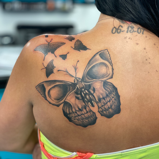 Find dino tattoo ideas for your next unique tattoo in Lockport at Archer Ink Tattoo
