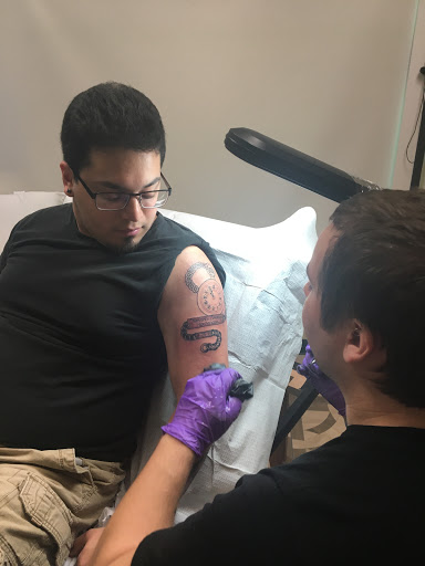 Explore music inspired tattoo ideas, creative tattoo ideas in Jacksonville, available at Electric Legacy Tattoo