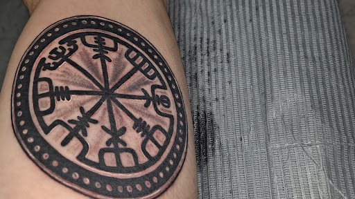 Explore cardinal tattoo ideas, creative tattoo ideas in Goshen, available at Lady Luck Studio