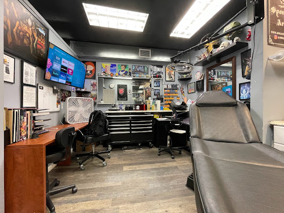 Zeus Tattoos - Uptown Manhattan