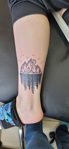 Explore outer thigh tattoo ideas, creative tattoo ideas in Molalla, available at Back40Tattoo