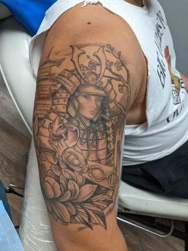 Explore cute face tattoo ideas, creative tattoo ideas in Tewksbury, available at Lucid Arts Tattoo Studio