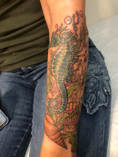 Explore military dog tag tattoo ideas, creative tattoo ideas in Honokaa, available at Sea of Light Tattoo Studio