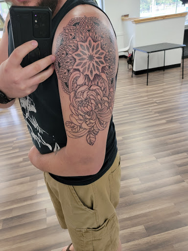 Explore mother and son tattoos ideas, creative tattoo ideas in Mount Clemens, available at Hand & Heart Tattoo