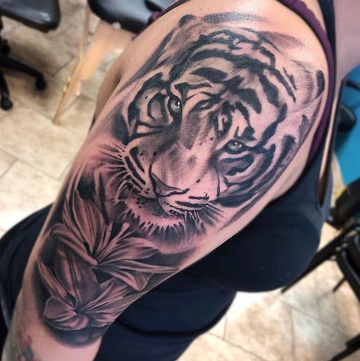 Explore neck tattoo ideas woman, creative tattoo ideas in Pittsburg, available at Delta Art & Tattoo