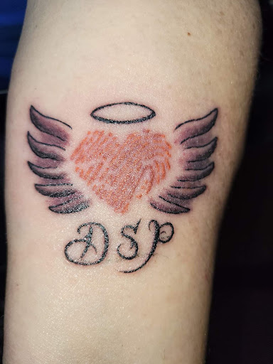 Explore melanoma tattoo ideas, creative tattoo ideas in Angola, available at Hoodlum Ink