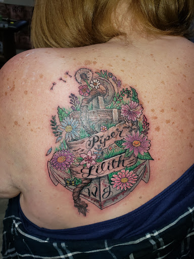 Explore black and grey realism tattoo ideas, creative tattoo ideas in Linn Creek, available at Hillard Skillard Tattoos, LLC.