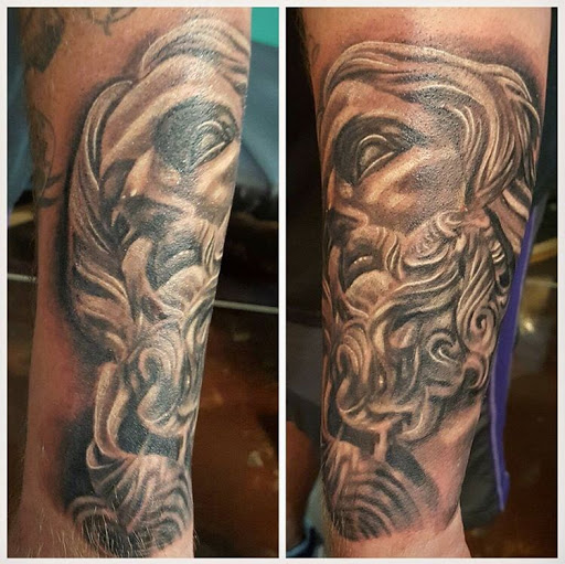 Explore abdomen tattoo ideas, creative tattoo ideas in San Diego, available at Sideshow Tattoo and Piercing