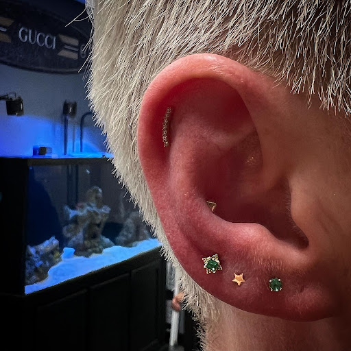 Find women's rib tattoo ideas for your next unique tattoo in Cary at Fine Art Body Piercing By Lilith Mae