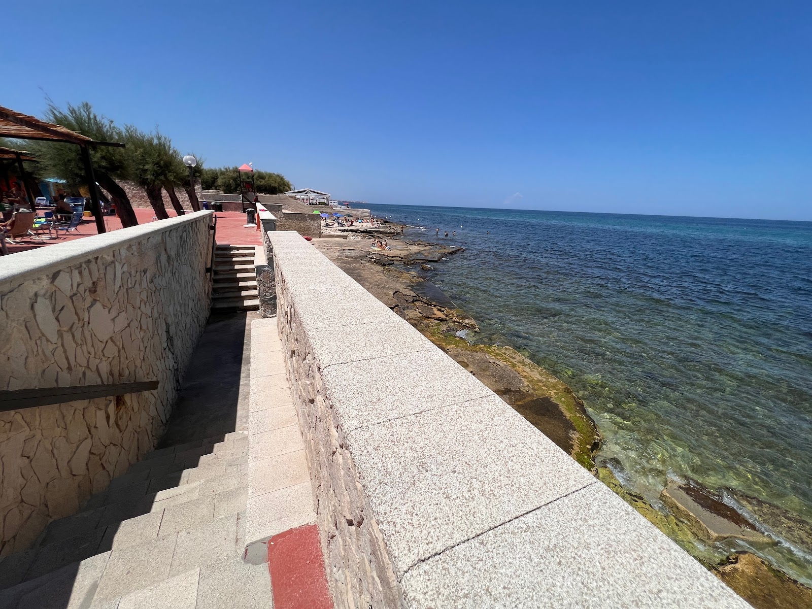 Lido Dieci Venti'in fotoğrafı geniş bir kıyı şeridi ile birlikte