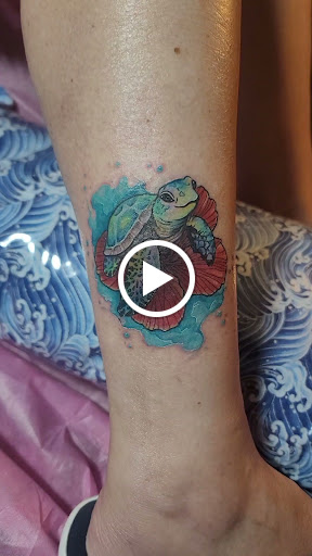 Explore july birth flower tattoo ideas, creative tattoo ideas in Hillsboro, available at Reflections Art Gallery and Studio