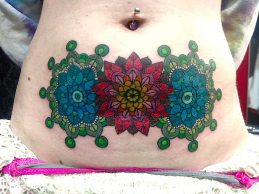 Explore uplifting tattoo ideas, creative tattoo ideas in Anniston, available at Infinity Ink