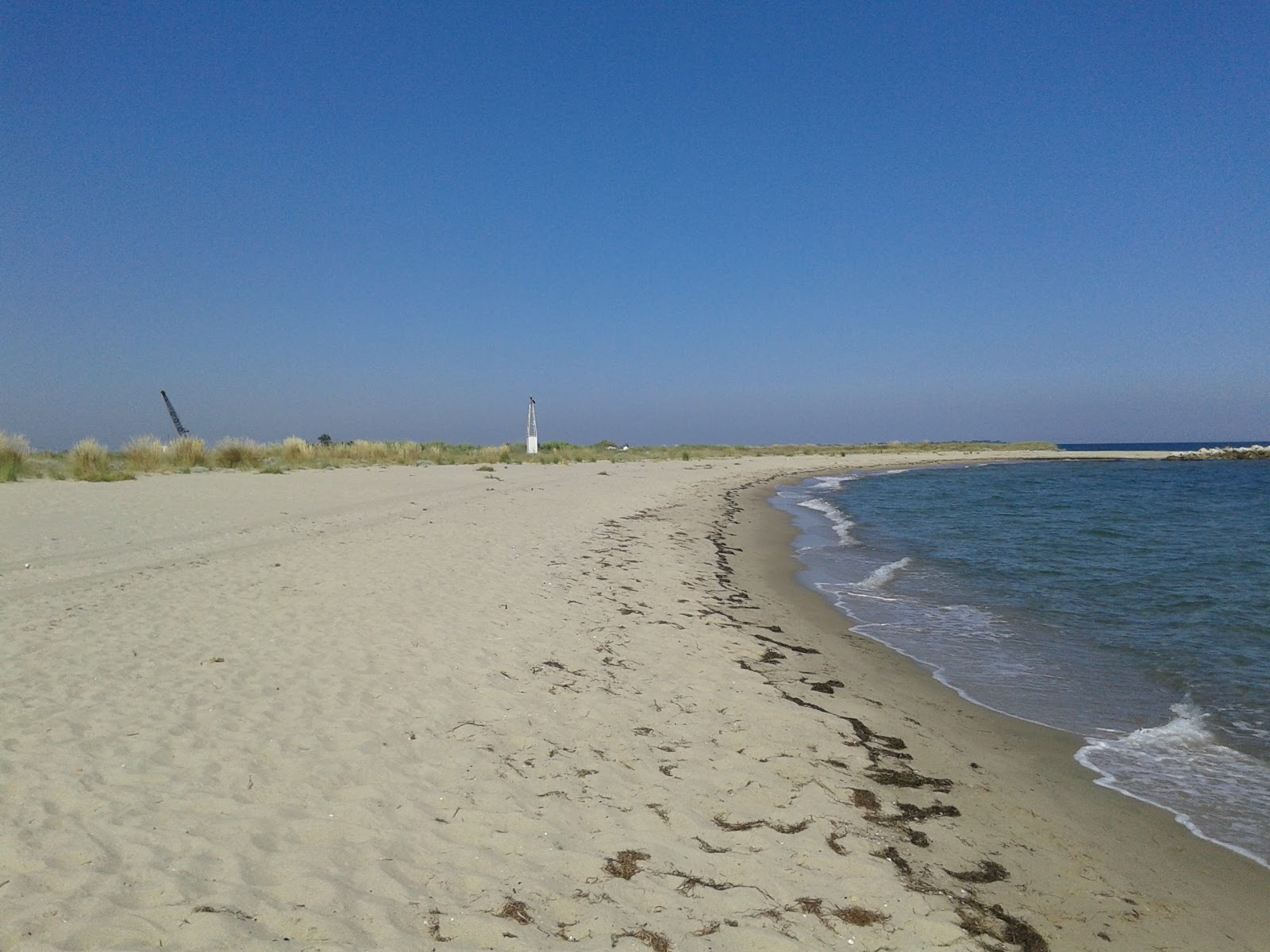 Foto van Agiasma beach met blauw puur water oppervlakte