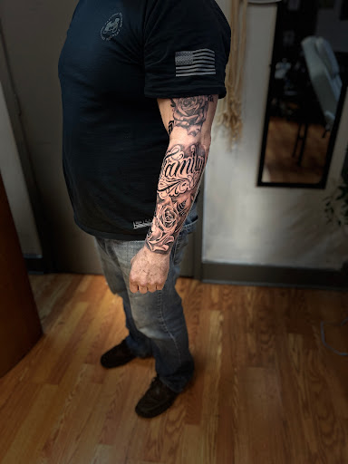 Explore ripped skin tattoo ideas, creative tattoo ideas in Menomonie, available at Blue Dragon Tattoo