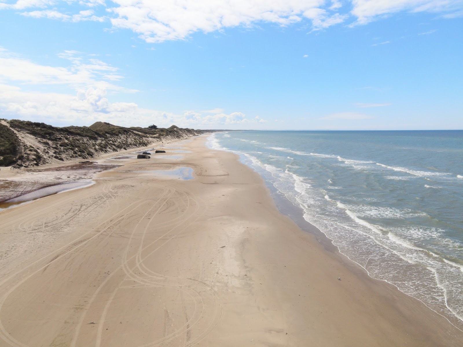 Fotografija Kandestederne Beach z svetel pesek površino