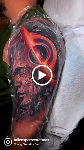 Explore black out tattoo ideas, creative tattoo ideas in Kissimmee, available at Fallen Sparrow Tattoo Co