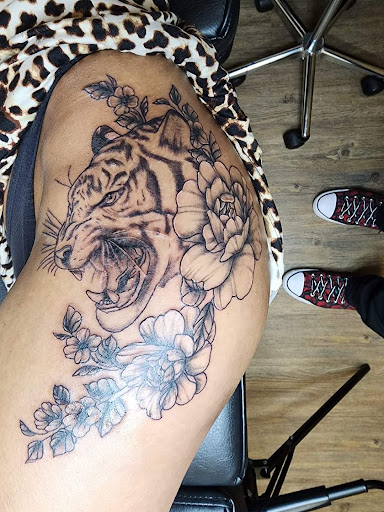 Explore ladies small tattoo ideas, creative tattoo ideas in Wisconsin Dells, available at Twisted Dimensions Tattoo Studio