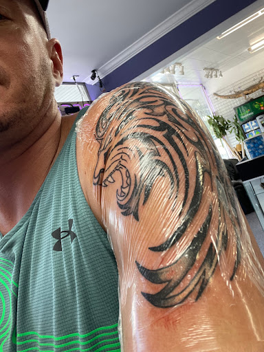 Explore halloween couple tattoo ideas, creative tattoo ideas in Sarasota, available at Z-Edge Tattoo and Body Piercing North Shop