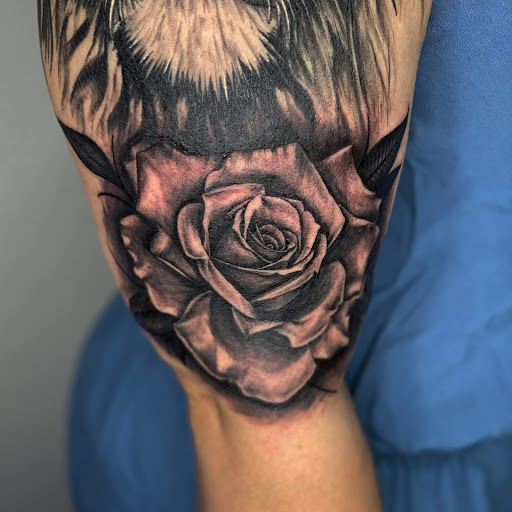 Explore alpha tattoo ideas, creative tattoo ideas in Goose Creek, available at Red Kirin Tattoo