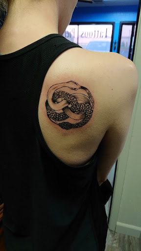 Explore women's leg tattoo ideas, creative tattoo ideas in Jonesboro, available at Immortal Ink