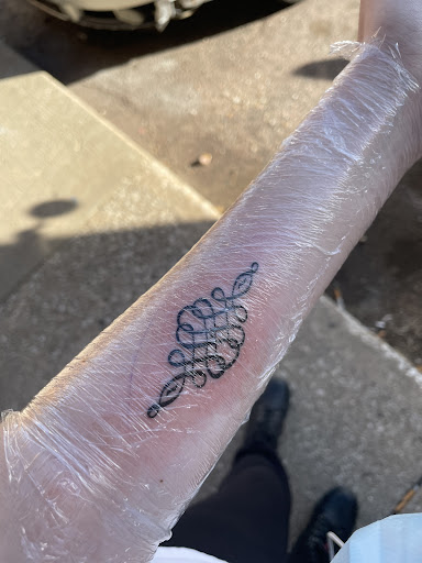 Explore tombstone tattoo ideas, creative tattoo ideas in Sioux City, available at Addictive Tattoo-Piercing