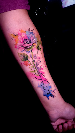 Explore birth flower tattoos ideas, creative tattoo ideas in Ridgewood, available at TOP SECRET TATTOO