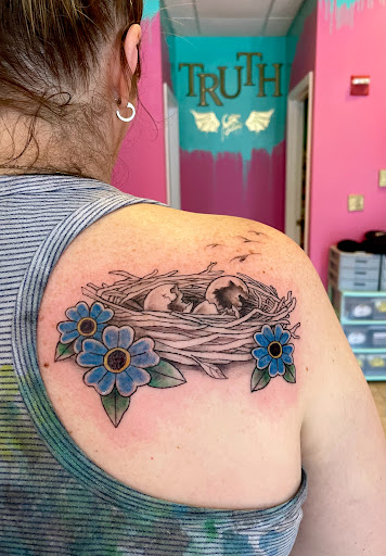 Explore tattoo ideas with your child's name, creative tattoo ideas in Berwick, available at Truth Custom Tattoo, Design & Gallery