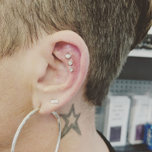 Explore sport tattoo ideas, creative tattoo ideas in Barberton, available at Magic City Tattoo Company