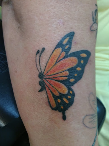 Explore small star tattoo ideas, creative tattoo ideas in Wilson, available at Everlasting Impressions Tattoo & Body piercings