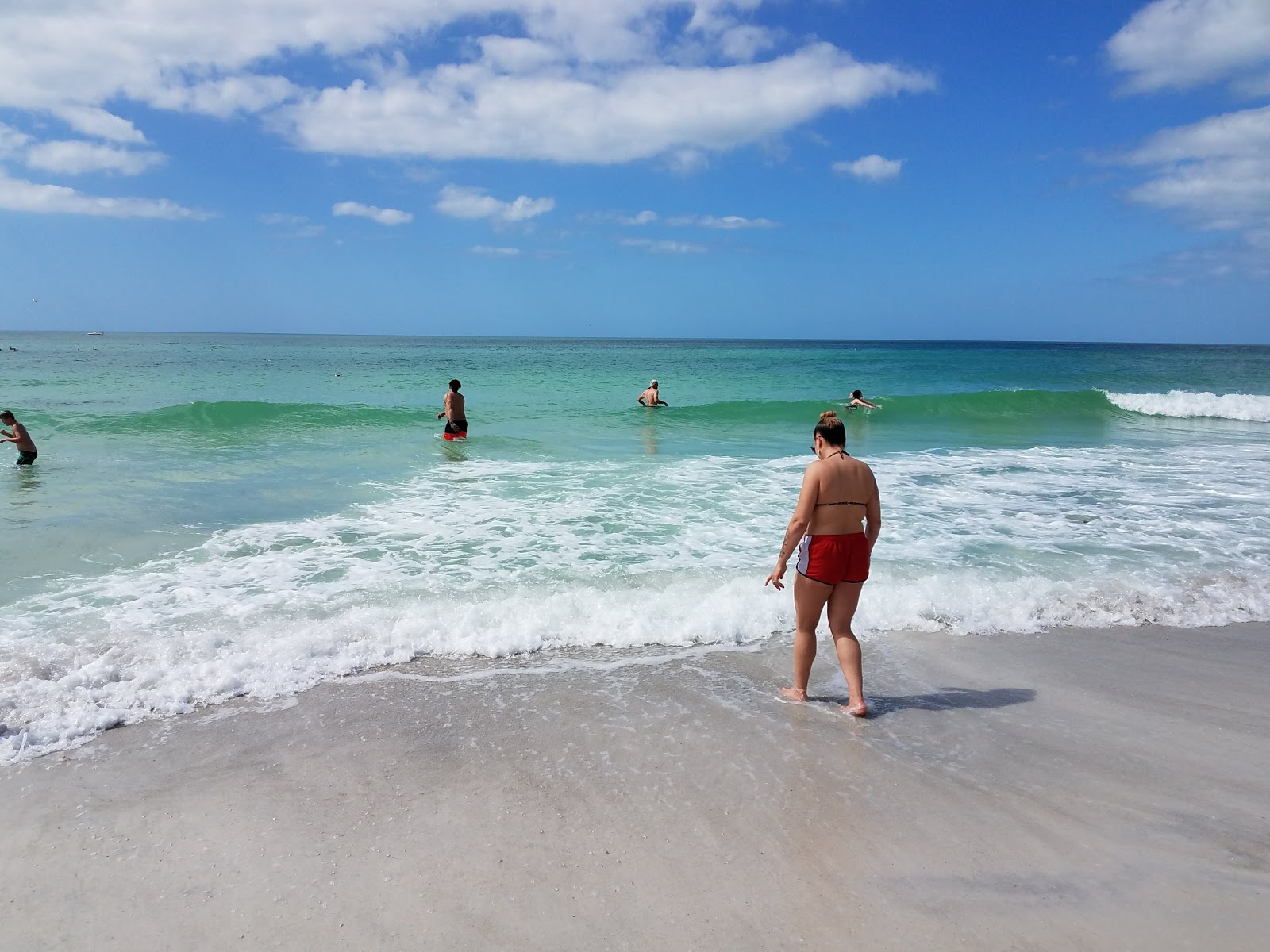Photo de Coquina beach avec l'eau turquoise de surface