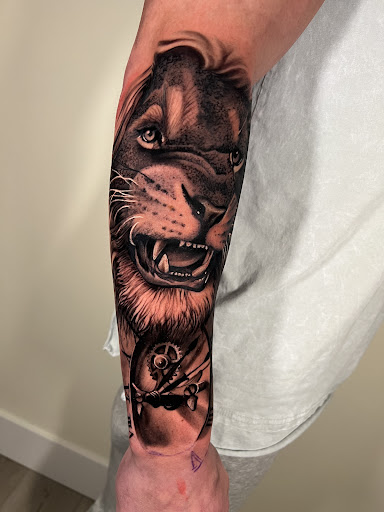 Explore brick tattoo ideas, creative tattoo ideas in Grand Haven, available at Ink Haven Tattoo Studio